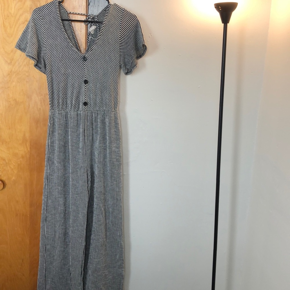 White and black striped jumpsuit.